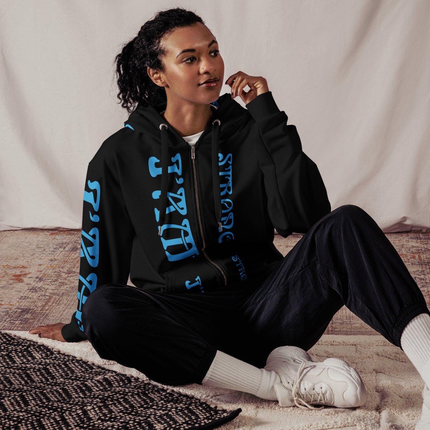 “I’AM STRONG!” Black Unisex Zip Hoodie W/SkyBlue Font