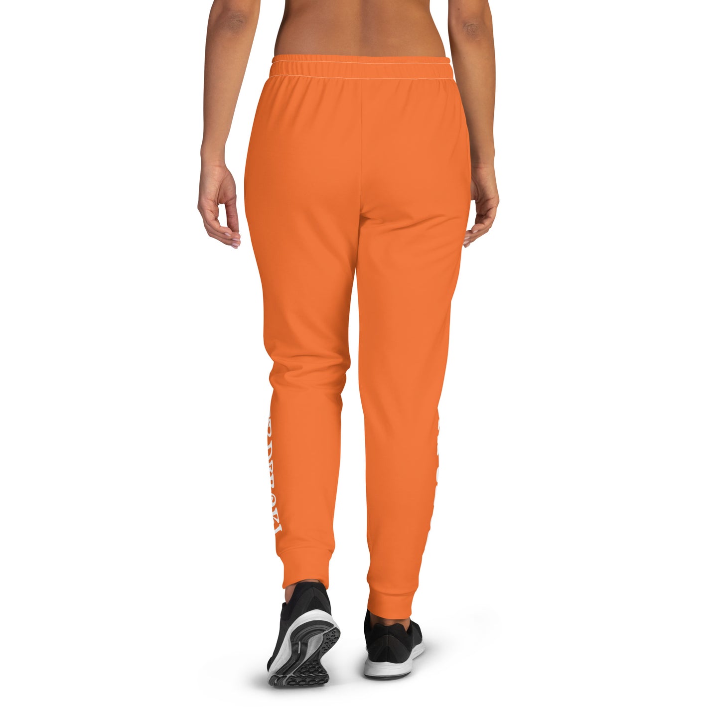 “I’M A MASTERPIECE!”Orange Women's Joggers W/White Font