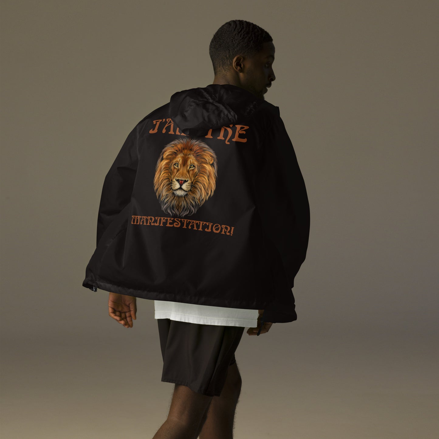 “I’AM THE MANIFESTATION!” Unisex Lightweight Zip Up Windbreaker W/Brown Font