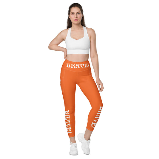 “BRAVE!” Orange Leggings W/Pockets & White Font