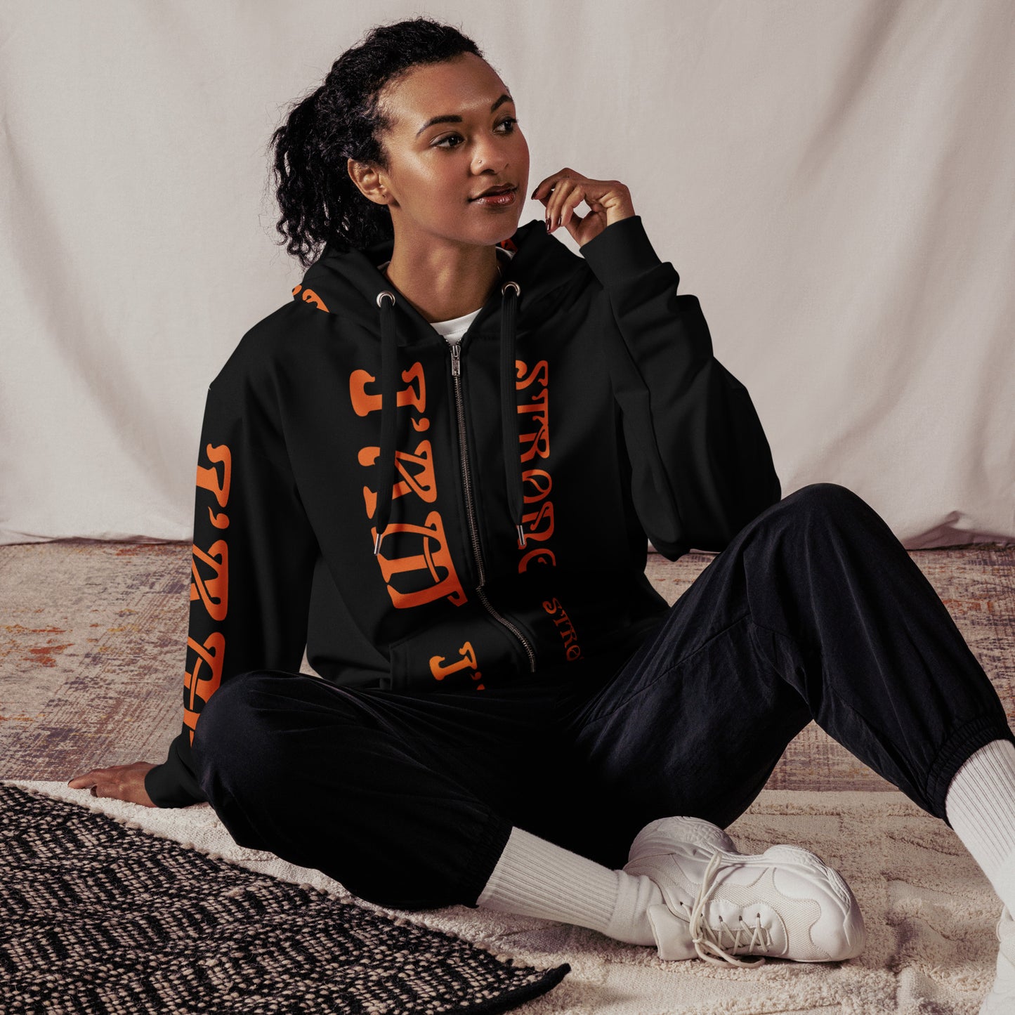 “I’AM STRONG!”Black Unisex Zip Hoodie W/Orange Font